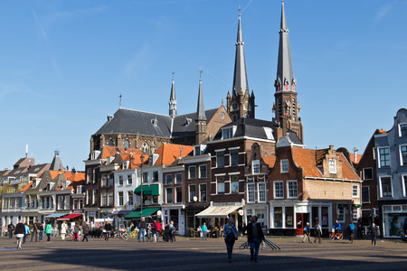 Historic Delft town centre with its variety of architecture and touristsのeditorial素材