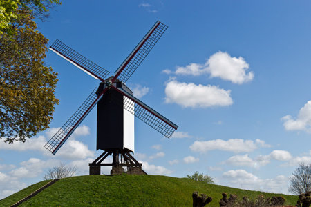 Old windmill in the european city of Bruges