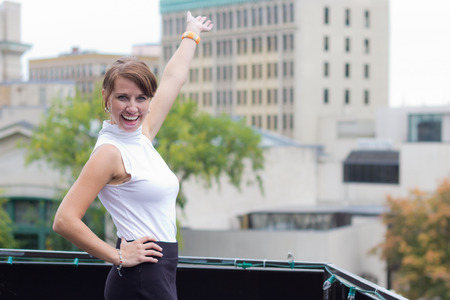 Young attractive business woman gesturing with arms - copy spaceの写真素材