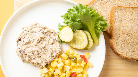 tuna salad with bread on wood table - Healthy food style and selective focus pointの写真素材