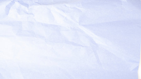 Crumpled paper background. Blue crumpled paper texture.の写真素材