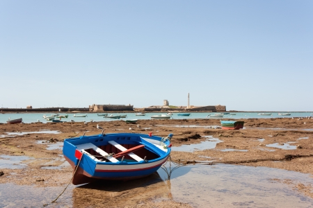A boat waiting for the tideの写真素材