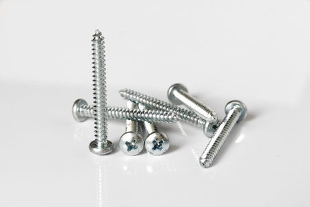 Screws on white background