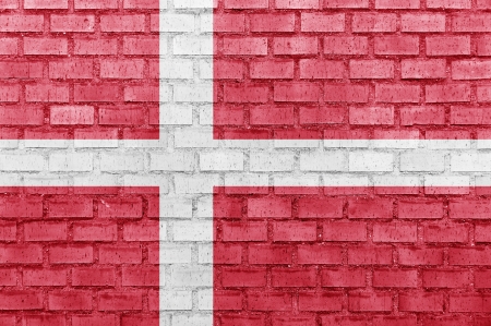 Denmark flag on a brick wallの写真素材