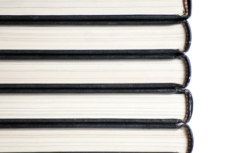 A stack of book spines on white background