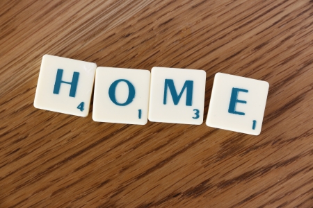  HOME  characters on a brown tableのeditorial素材