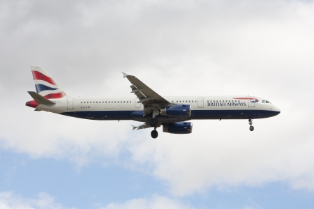 Madrid, Spain - May 18th, 2013: A BRITISH AIRWAYS Company's plane lands in Barajas Airport, Madrid, Spain.のeditorial素材