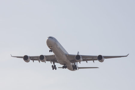 A photo of an airplane taken land in Madrid, Spain