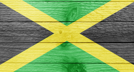 The Jamaican flag on a wood plankの写真素材