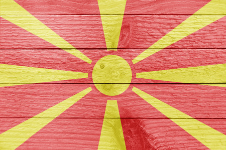 The Macedonian flag on a wood plankの写真素材
