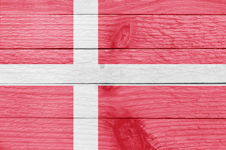 Flag of Denmark on a wooden plankの写真素材