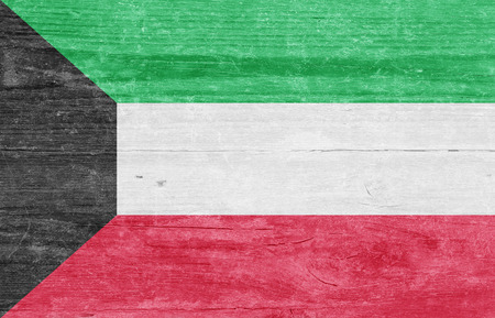 The Kuwaiti flag on a wood plankの写真素材