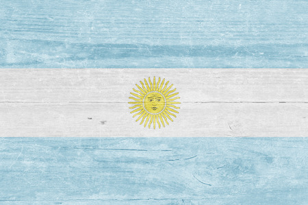 Argentinian flag on a wooden plankの写真素材