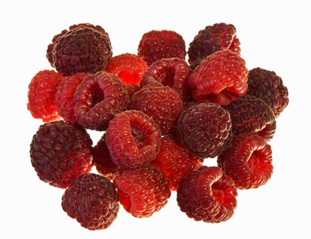 Ripe sweet and fresh raspberry isolated on white