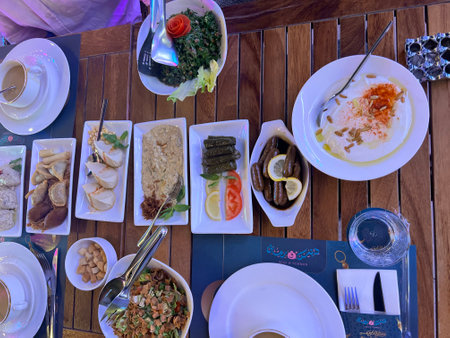 Restaurant set with a variety of dishes on the table.の写真素材