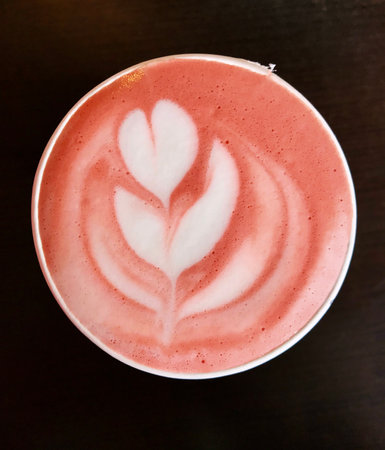 Hot chocolate with latte art on top in coffee shop, stock photoの写真素材