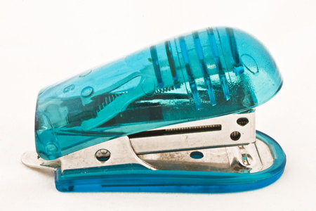 Blue stapler isolated on a white background