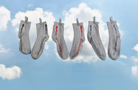 Socks hanging wireless in the air to dry out