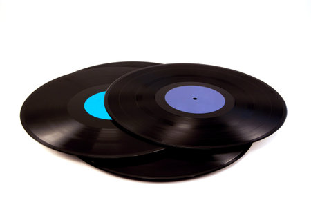 a pile of vinyl with white background