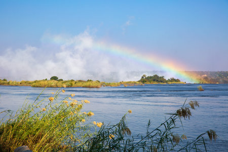 Scenic view of a rainbow on Livingstone Island, Zambiaの写真素材