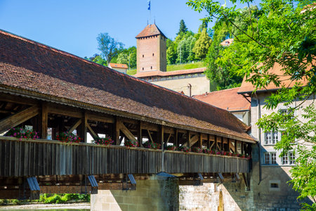 Pont de Berne, wooden bridge over river Sarine in Fribourg, Switzerlandの写真素材