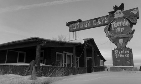 An abandoned Inn along the highway in Wyoming during Winter.の写真素材
