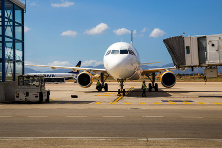 Photograph of an airplane arriving at the stand in Palma Pallorca Airport