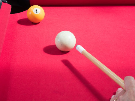 Game of american billiards  played on a billiard table for two persons