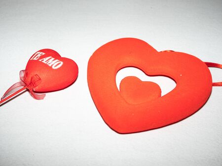 Red hearts on white background for Valentines Day celebration.の写真素材