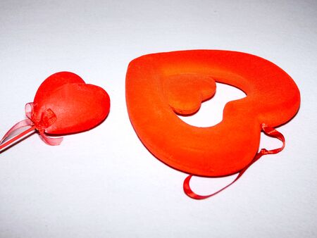 Red hearts on white background for Valentines Day celebration.の写真素材