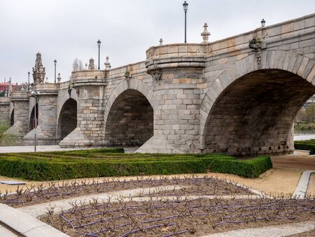 Toledo bridge built in the eighteenth century over the river Manzanares in Madridの写真素材