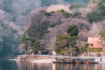 Kyoto, Japan - Jan 17, 2018. A tourist boat on Hozu River at Arashiyama in Kyoto, Japan. Arashiyama is a nationally designated Historic Site and Place of Scenic Beauty.のeditorial素材