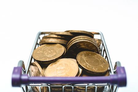 Shopping cart full of Taiwan Coinの写真素材