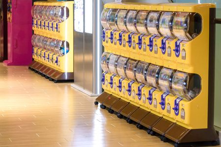 Taipei, Taiwan - Mar 17, 2018 : Gachapon, yellow capsule toy vending machine