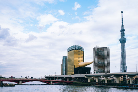 October 29, 2016: Tokyo skyscraper across the river in Asakusa including the Tokyo Skytree and the Asahi Beer Hall in Tokyo, Japanのeditorial素材