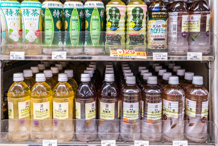 TOKYO, JAPAN - June 23 2018 : Drink products in Japanese supermarket taken in Tokyo. Variety of drinks on shelves in convenience store in Japan.のeditorial素材
