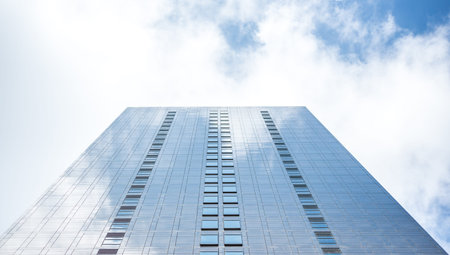 underside panoramic and perspective view to steel blue glass high rise building skyscrapers,...