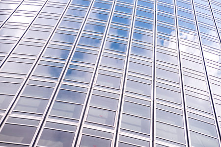 underside panoramic and perspective view to steel blue glass high rise building skyscrapers,...