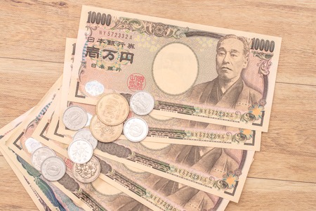 Japanese yen banknotes and Japanese yen coinの写真素材