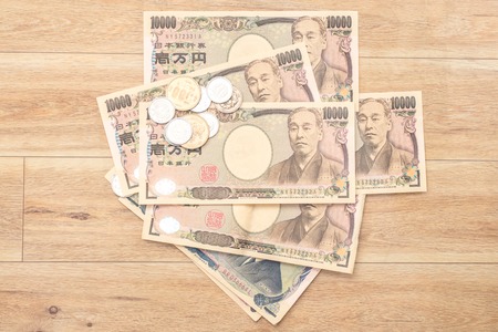 Japanese yen banknotes and Japanese yen coinの写真素材