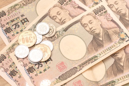Japanese yen banknotes and Japanese yen coinの写真素材
