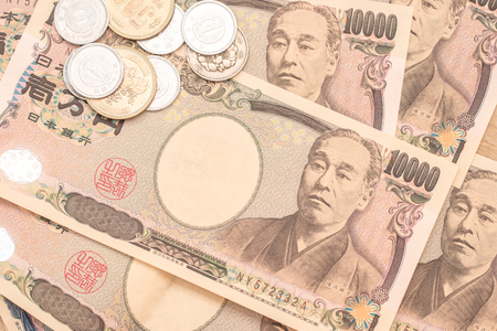 Japanese yen banknotes and Japanese yen coinの写真素材