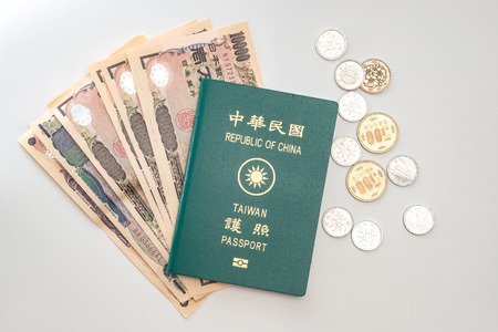 Japanese yen banknotes, Japanese yen coin and ROC Taiwan passportsの写真素材