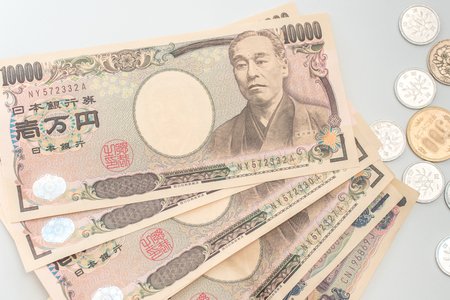 Japanese yen banknotes and Japanese yen coinの写真素材