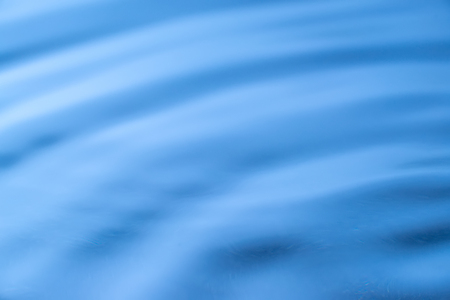 Blue Tones Water Waves Surface as Backgroundの写真素材