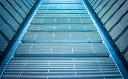 underside panoramic and perspective view to steel blue glass high rise building skyscrapers, business concept of successful industrial architectureの写真素材