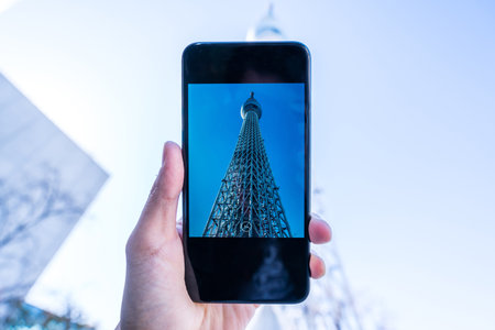 TOKYO, JAPAN - November 23, 2018: A part of Japan Tokyo skytree tower building with blue skyのeditorial素材