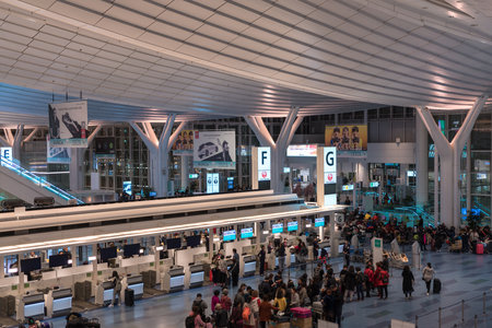 Tokyo, Japan - March 29, 2019. People waiting at Departure Terminal of Haneda Airport in Tokyo, Japan. Haneda was the primary international airport serving Tokyo until 1978.のeditorial素材