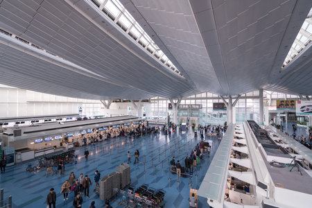 Tokyo, Japan - March 25, 2019. People waiting at Departure Terminal of Haneda Airport in Tokyo, Japan. Haneda was the primary international airport serving Tokyo until 1978.のeditorial素材