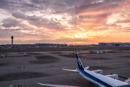 Tokyo, Japan - March 25, 2019. Tokyo International Airport at sunrise / sunset panorama, Haneda Airport in Tokyo, Japan.のeditorial素材